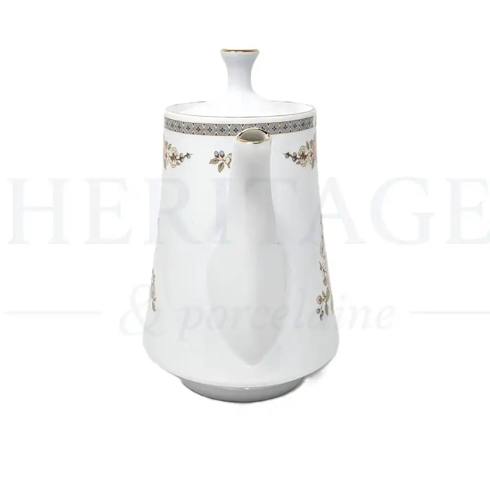Vintage Floral Mist Coffee Pot with Lid by Fairfield, made in Japan, featuring the delicate floral design of the discontinued Floral Mist pattern.