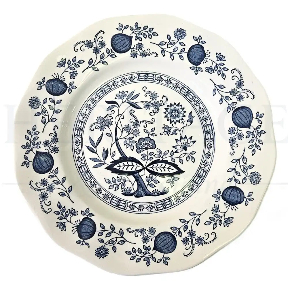 Wedgwood Blue Onion dinner plate featuring a classic blue and white floral pattern.
