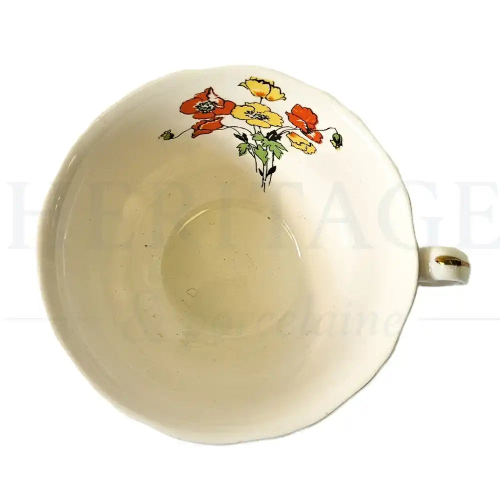 Alfred Meakin Royal Marigold flat cup featuring a classic vintage decorative pattern.