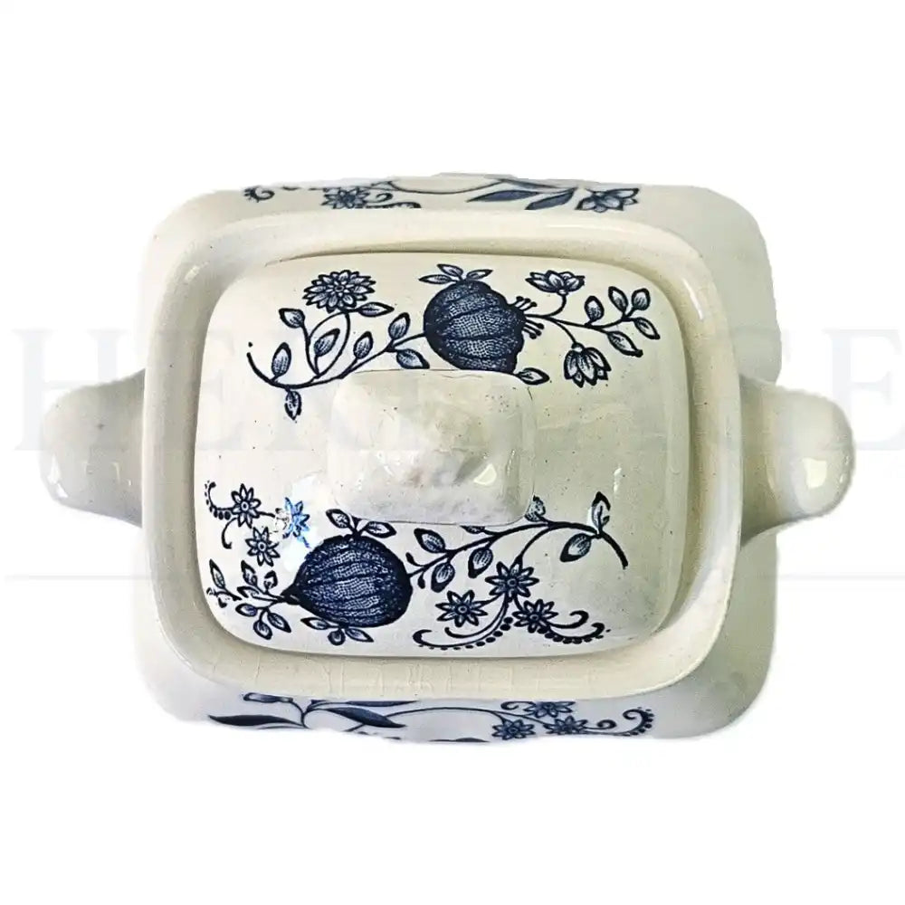 Wedgwood Blue Onion sugar bowl with lid, featuring a classic blue and white floral pattern.