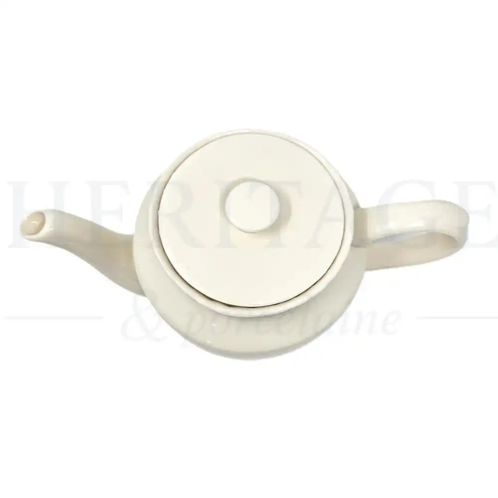 Vintage Godinger Regal Cream teapot with lid, made in China, featuring the classic Regal Cream pattern.