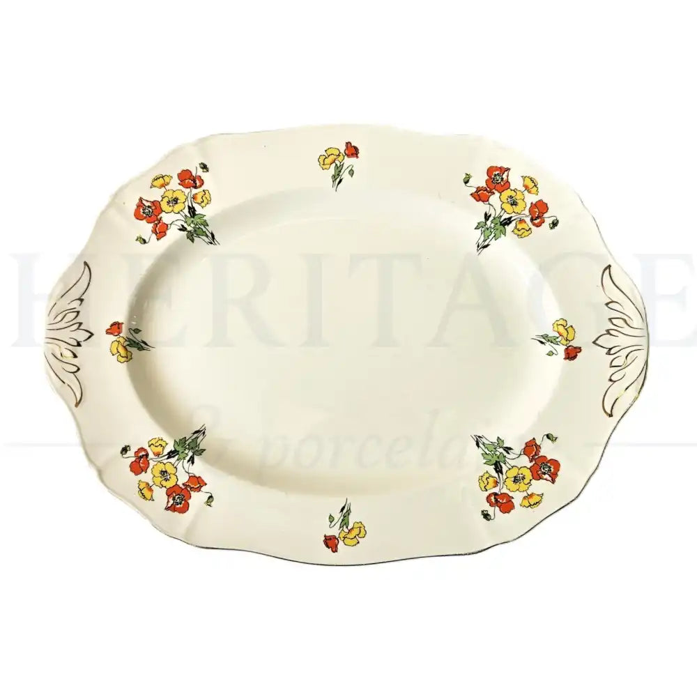 Vintage Alfred Meakin Royal Marigold 12-inch oval serving platter, made in England, featuring the classic Royal Marigold floral pattern. Discontinued collectible replacement piece in used condition.