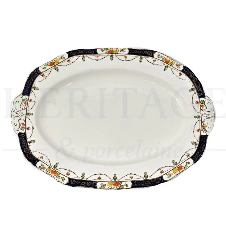 Vintage Alfred Meakin Solway 12-inch oval serving platter, made in England, featuring the classic Solway pattern.