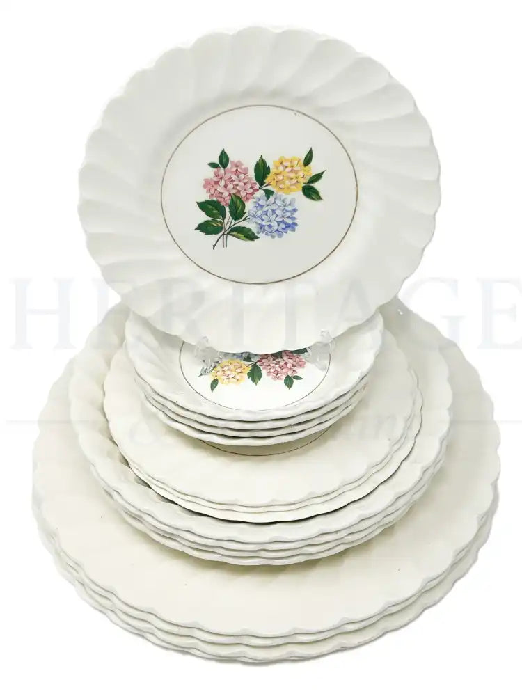 Vintage Hydrangea 16-piece dinnerware set by Myott Staffordshire, made in England, with dinner plates, fruit & dessert bowls, bread & butter plates and soup bowls.
