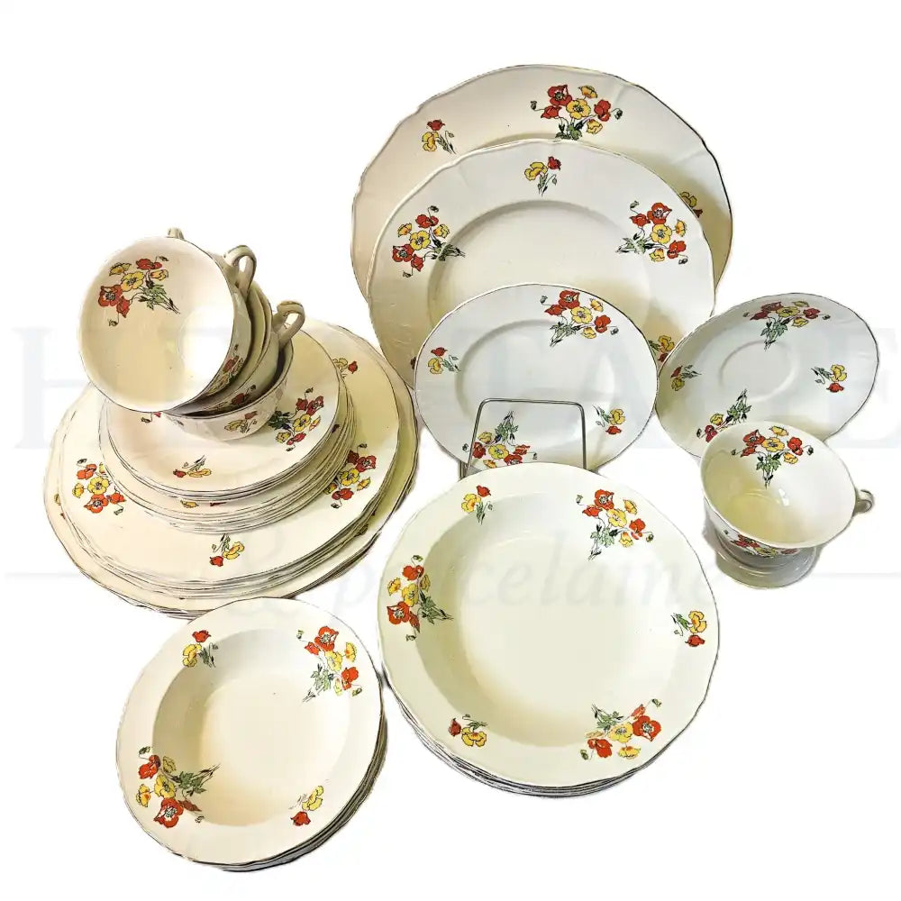 Alfred Meakin Royal Marigold 35-piece dinnerware set featuring a classic vintage decorative pattern.
