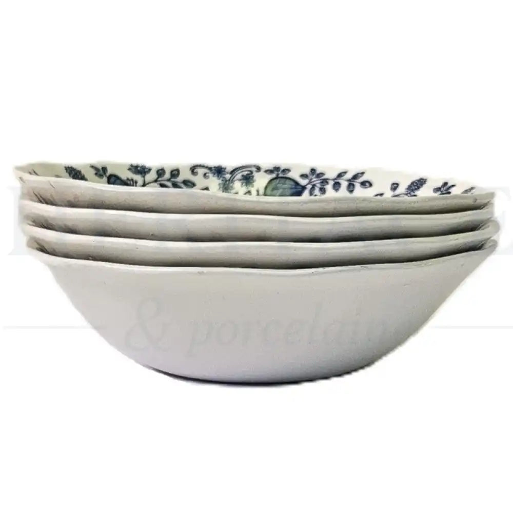 Wedgwood Blue Onion 4-piece cereal bowl set featuring a classic blue and white floral pattern.