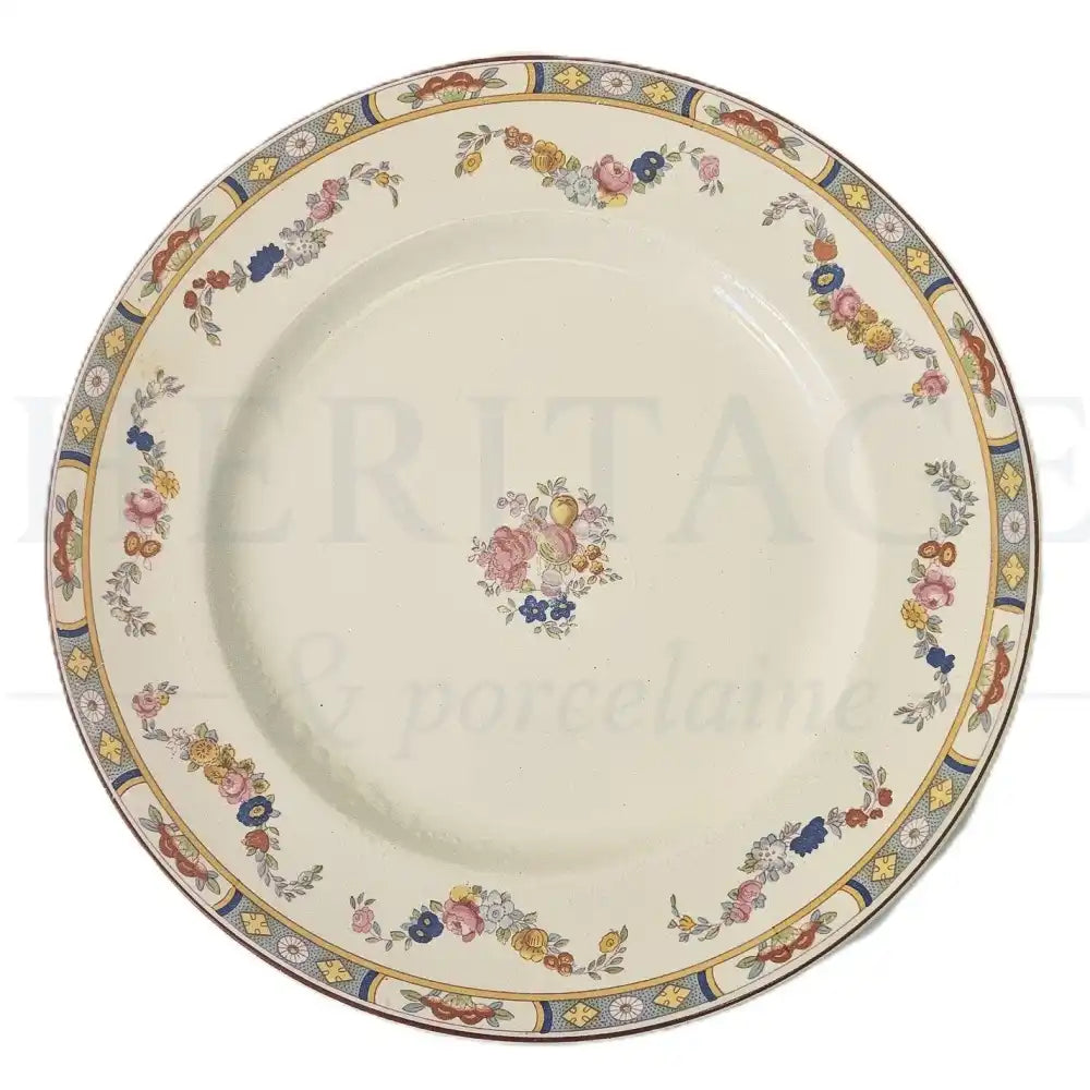 Johnson Brothers Arundale dinner plate featuring a classic floral pattern.