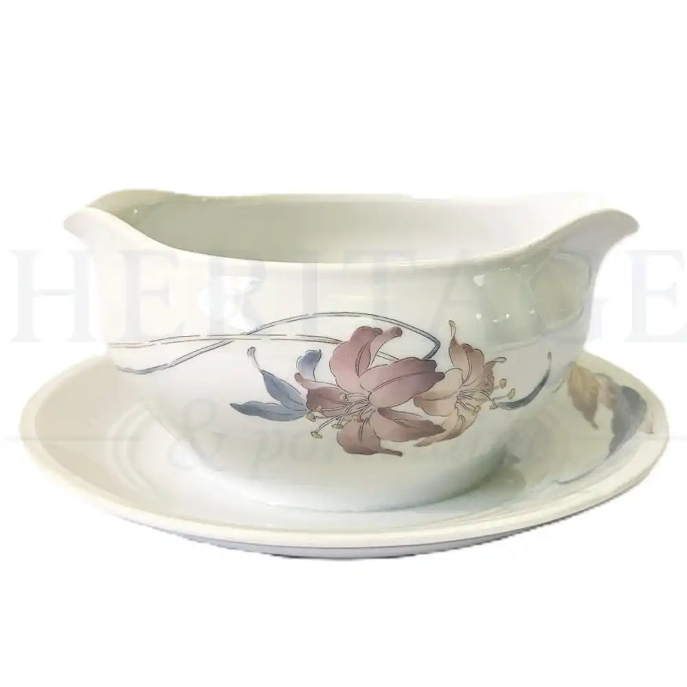 Fine China of Japan Anatole gravy boat with underplate featuring an elegant vintage decorative pattern.
