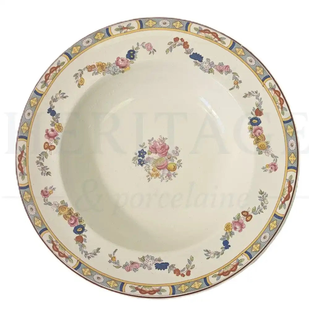 Johnson Brothers Arundale soup bowl featuring a classic floral pattern.